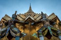 Giants sculpture standing in front of Pagoda in The Royal Grand Palace, Bangkok, Thailand Royalty Free Stock Photo