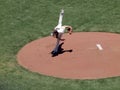 Giants two time Cy Young award winner Tim Lincecum finishes throwing a pitch by lifting back leg high into the air