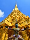 Giants under golden pagoda Royalty Free Stock Photo