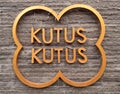 Kutus Kutus brand name on a rocky surface