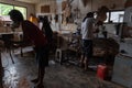 GIANYAR,BALI/INDONESIA-MAY 30 2019: The guitar craftsmen are working on making guitars in a classical guitar workshop owned by I