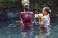 Women At Holy spring water at Pura Tirta Empul temple Royalty Free Stock Photo