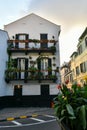 Gibraltar a beautiful flowery old building at the crossroads of the street