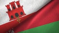 Gibraltar and Belarus two flags textile cloth, fabric texture