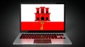 Gibraltar - country flag and binary code on laptop screen