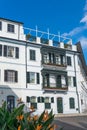 Gibraltar, UK - January 7, 2020: Street view. Royal Strelitzia on the building background. Vertical