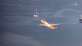 EasyJet Airplane taking off from the airport during morning. Aerial View from Rock of Gibraltar