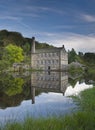 Gibson mill reflection in mill pond Royalty Free Stock Photo