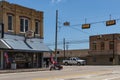 Stret scene in the city of Giddings in the intersection of U.S. Highways 77 and 290 in Texas Royalty Free Stock Photo