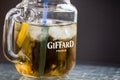 Giffard France logo on a mason jar containing one of their beverages. Giffard is a French brand of syrups and flavored liquors Royalty Free Stock Photo