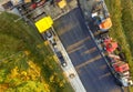 Gifhorn, Germany, September 18., 2016: Aerial photograph of a road construction site where new asphalt is applied to the old