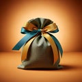 Gift Bag with Bow on Orange Background Royalty Free Stock Photo