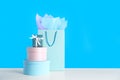 Gift bag and boxes on white table against light blue background. Space for text Royalty Free Stock Photo