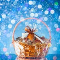 Gift basket with festive particles, blue background Royalty Free Stock Photo