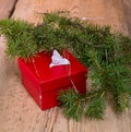 Gift black box with fir branches