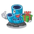 With gift blue sponge coral isolated the mascot Royalty Free Stock Photo