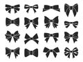 Gift bow icons. Decorative black bows silhouettes, elegant ribbon for birthday present boxes packaging. Xmas fashion Royalty Free Stock Photo