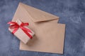 Gift box and blank two brown envelope Royalty Free Stock Photo