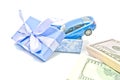 Gift box with blue car and money Royalty Free Stock Photo