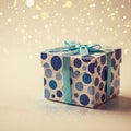 Gift Box with Blue Polka Dots and Sparkles Royalty Free Stock Photo