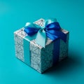Gift Box with Blue Ribbon on Blue Background Royalty Free Stock Photo