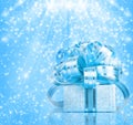 Gift box in blue wrapping paper Royalty Free Stock Photo