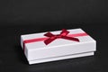 Gift box with bow for gifts on Christmas, birthday or Valentines Royalty Free Stock Photo