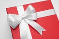 Gift box with bow on light grey background, closeup Royalty Free Stock Photo