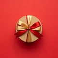 Gift Box with Bow on Red Background Royalty Free Stock Photo