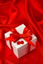 Gift box, bow ribbon, petals of roses flower Royalty Free Stock Photo