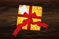 Gift box with a bow for Valentine`s Day or Birthday. Free note f