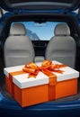 Gift box in the car. Generative AI Royalty Free Stock Photo