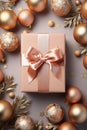 Gift box with christmas decor on color background Royalty Free Stock Photo