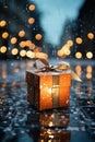 a gift box in city street in winter, exteriors of the house are decorated for Christmas or New Year\'s holiday, street Royalty Free Stock Photo