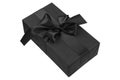 Gift box closeup isolated on white background. Holiday luxury black gift box Royalty Free Stock Photo