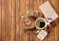 Gift box, cup of coffee, male accessories and baby shoes on wooden background. Happy Father\'s Day celebration