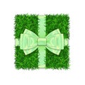 Gift box 3D. Green grass box top view, green ribbon bow isolated white background. Nature friendly design. Eco packaging Royalty Free Stock Photo