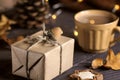 Gift box decorated with acorn and a cup of coffee.