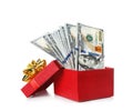 Gift box with dollar banknotes Royalty Free Stock Photo