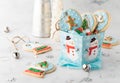 A gift box filled with colourful homemade snow globe sugar cookies. Royalty Free Stock Photo