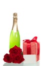 Gift box, flowers, bottle of wine on white Royalty Free Stock Photo