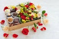 Gift box with flowers and candies made of chocolate Royalty Free Stock Photo