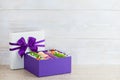 Gift box with flowers and macaroon Royalty Free Stock Photo