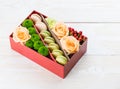 Gift box with flowers and macaroon Royalty Free Stock Photo
