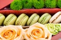 Gift box with flowers and macaroon Royalty Free Stock Photo