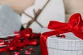 Gift box in the form of a heart. On the edge of the box are ladybugs in love. Royalty Free Stock Photo