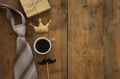 gift box, glitter crown, necktie and cup of coffee. Father& x27;s day concept