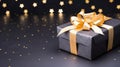 Gift box with gold ribbon on black background with bokeh Royalty Free Stock Photo