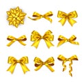 Gift box golden bows, realistic golden silk ribbon Royalty Free Stock Photo