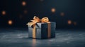 a gift box with a golden ribbon on a dark background